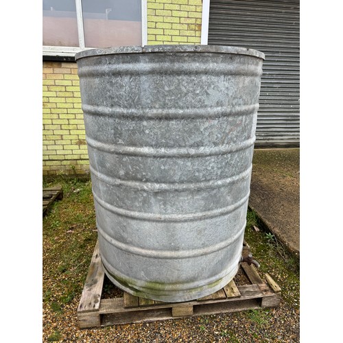 1 - A large galvanized fuel storage tank of ribbed design together with tap and cap. Measuring approx 13... 