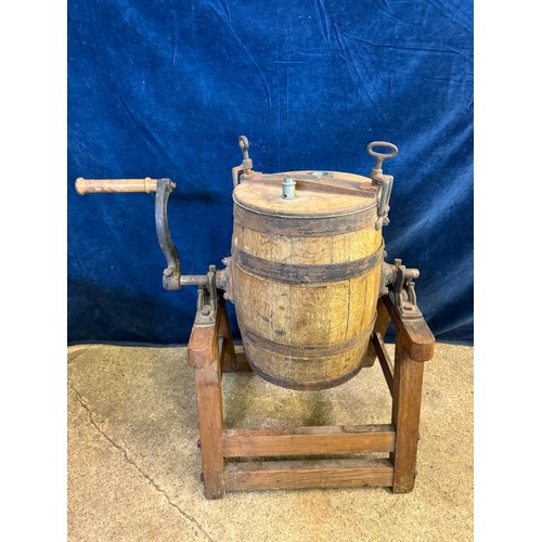 10 - A vintage barrel butter churn on wooden stand, with suppliers label - Corts Limited, Ironmongers.