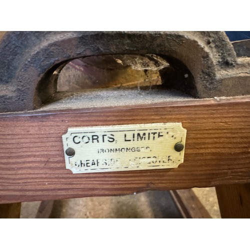 10 - A vintage barrel butter churn on wooden stand, with suppliers label - Corts Limited, Ironmongers.