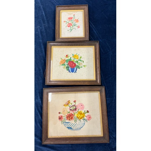 68 - Three framed vintage needlework pictures depicting flowers.