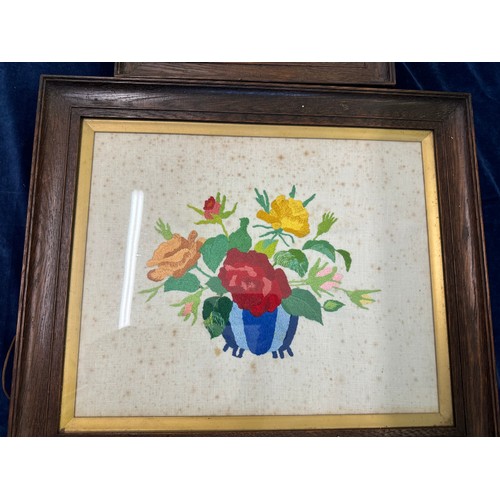 68 - Three framed vintage needlework pictures depicting flowers.