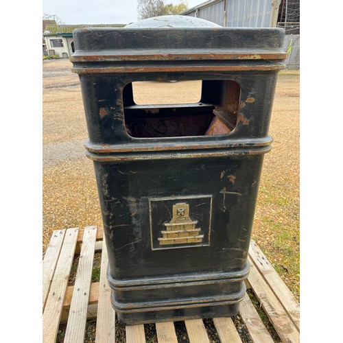 2 - A metal litter bin.