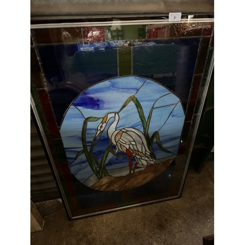 9 - A stained glass panel depicting a heron - housed within a glazed frame.