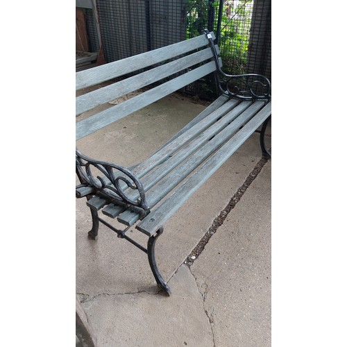 214 - CAST IRON FRAMED WOODEN SLATTED BENCH