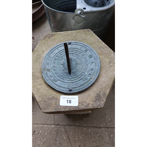 18 - SMALL CAST SUNDIAL ON A CONCRETE BASE. HEIGHT 29CM