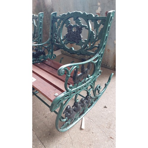 28 - 2 CHILD'S CAST IRON ROCKING CHAIRS WITH TEDDY BEAR DESIGN BACKS