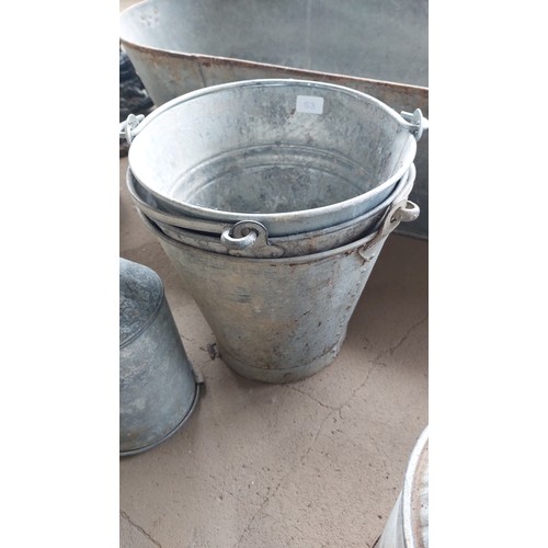 53 - 3 OLD BUCKETS AND 2 GALVANISED FEEDER TOPS