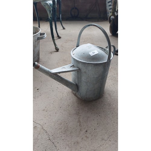 63 - 2 GALVANISED WATERING CANS