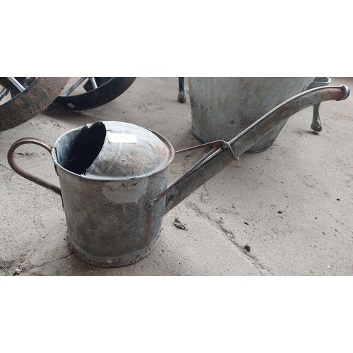 63 - 2 GALVANISED WATERING CANS