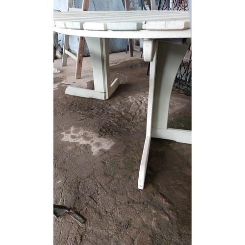 218 - HEAVY WOODEN EXTENDABLE GARDEN TABLE