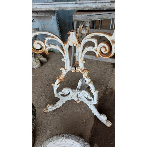 221 - CAST IRON TABLE BASE WITH A MARBLE TOP. HEIGHT 28CM, LENGTH 60CM, WIDTH 60CM