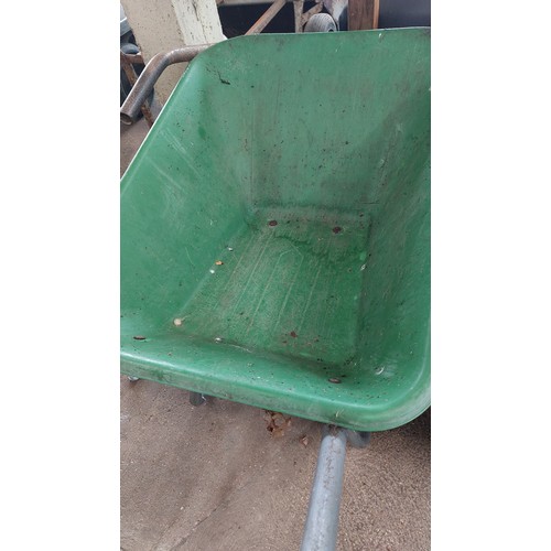 255 - PLASTIC GREEN WHEELBARROW