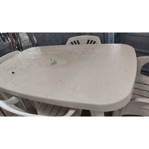 262 - WHITE PLASTIC TABLE WITH 4 GARDEN CHAIRS