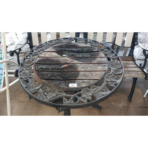 266 - BLACK CAST METAL WITH GRAPE DESIGN GARDEN TABLE AND 2 ARMCHAIRS