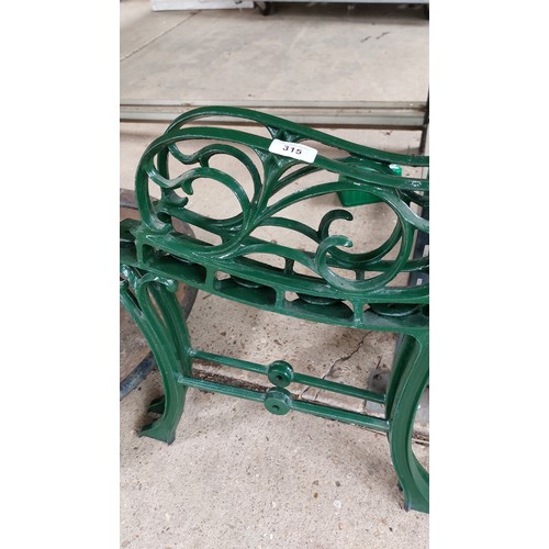 315 - 2 GREEN METAL BENCH ENDS