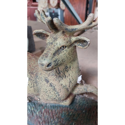 331 - CAST IRON DOORSTOP OF A STAG