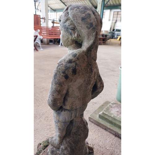 395 - CONCRETE GARDEN ORNAMENT OF A BOY WITH HIS HANDS IN HIS POCKETS - HEIGHT 66CM