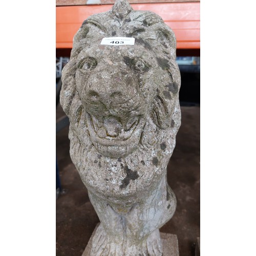 403 - CONCRETE GARDEN ORNAMENT OF A LION - HEIGHT 66CM