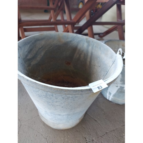 83 - 3 LARGE GALVANISED BUCKETS MEASURING APPROXIMATELY (35CM X 32), (29CM X 26 1/2CM) AND (33 1/2CM X 31... 