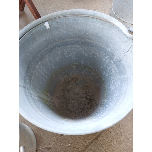 83 - 3 LARGE GALVANISED BUCKETS MEASURING APPROXIMATELY (35CM X 32), (29CM X 26 1/2CM) AND (33 1/2CM X 31... 