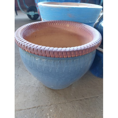 54 - 5 VARIOUS SIZED BLUE GLAZED PLANT POTS