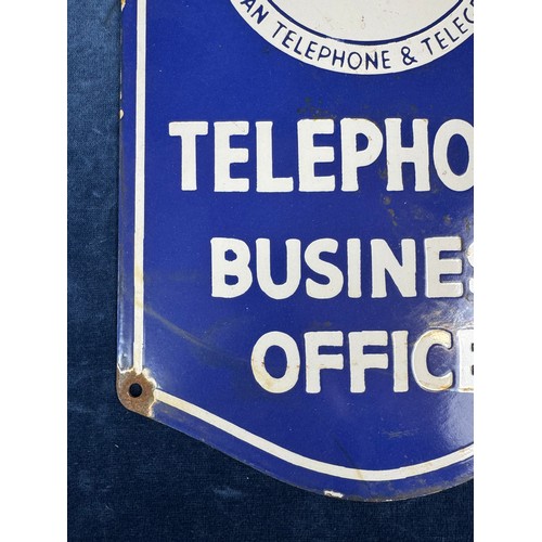 46 - A vintage enamel sign reading 'Southwestern Bell telephone Co - American telephone & telegraph Co - ... 