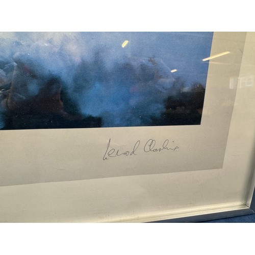 30 - A framed coloured print depicting 'Lancaster' by Robert Taylor, signed by Group Captain Leonard Ches... 