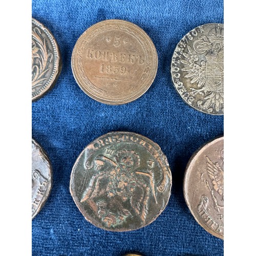 A collection of unusual coins/ tokens, including a National Transport ...