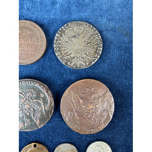 A collection of unusual coins/ tokens, including a National Transport ...