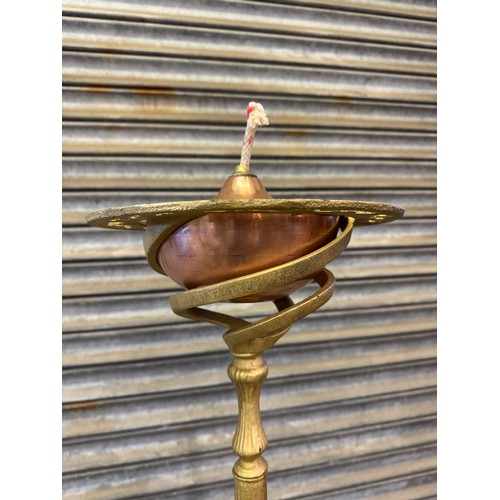 25 - A pair of cast iron oil lamp stands, each with a copper burner - stands painted a gold colour. 
Over... 