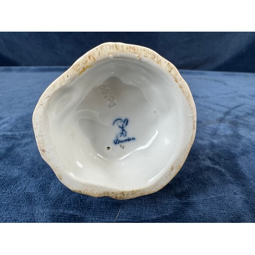 216 - A pair of Dresden porcelain figures depicting a huntsman with rifle and a dog, and a lady holding a ... 