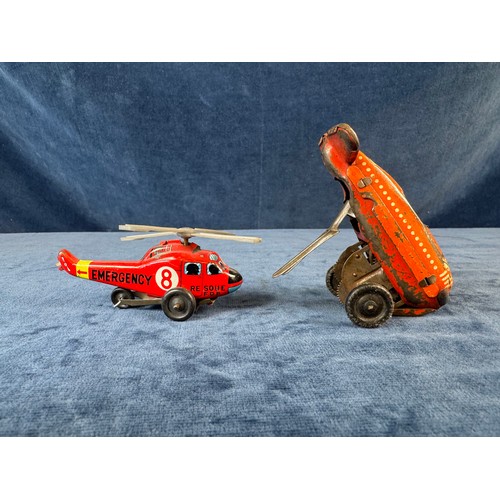 248 - A collection of 8 tin plate toy vehicles, including; A Kanto toys fire engine, 2 helicopters, police... 
