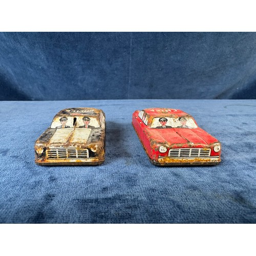 248 - A collection of 8 tin plate toy vehicles, including; A Kanto toys fire engine, 2 helicopters, police... 