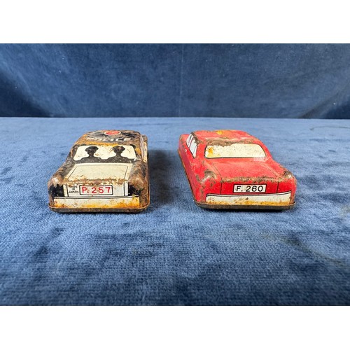 248 - A collection of 8 tin plate toy vehicles, including; A Kanto toys fire engine, 2 helicopters, police... 