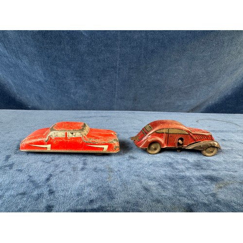 248 - A collection of 8 tin plate toy vehicles, including; A Kanto toys fire engine, 2 helicopters, police... 