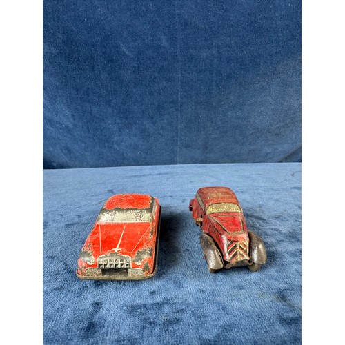 248 - A collection of 8 tin plate toy vehicles, including; A Kanto toys fire engine, 2 helicopters, police... 