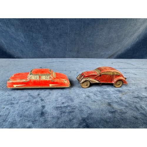 248 - A collection of 8 tin plate toy vehicles, including; A Kanto toys fire engine, 2 helicopters, police... 