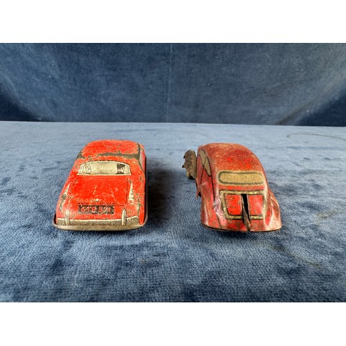 248 - A collection of 8 tin plate toy vehicles, including; A Kanto toys fire engine, 2 helicopters, police... 
