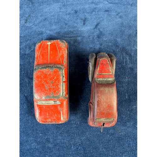 248 - A collection of 8 tin plate toy vehicles, including; A Kanto toys fire engine, 2 helicopters, police... 