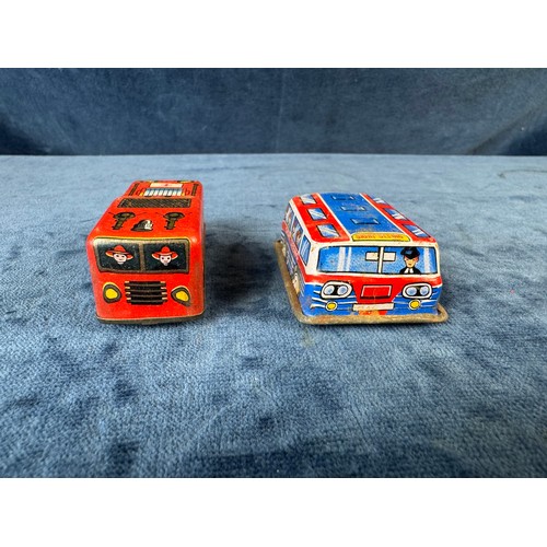 248 - A collection of 8 tin plate toy vehicles, including; A Kanto toys fire engine, 2 helicopters, police... 