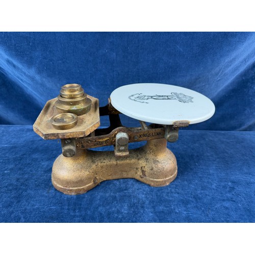 276 - A vintage set of weighing scales with ceramic weighing platform, marked 