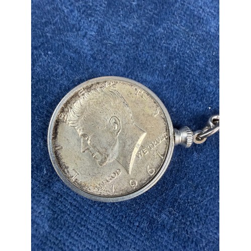 174 - A small collection of interesting items, comprising; a metal thimble in case, a USA half dollar moun... 