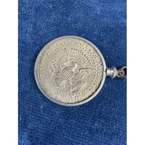 174 - A small collection of interesting items, comprising; a metal thimble in case, a USA half dollar moun... 