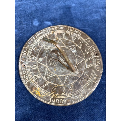 372 - An antique bronze sun dial. Width 18cm approximately.