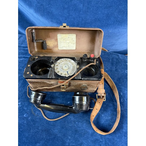 380 - A vintage bakelite field telephone.
