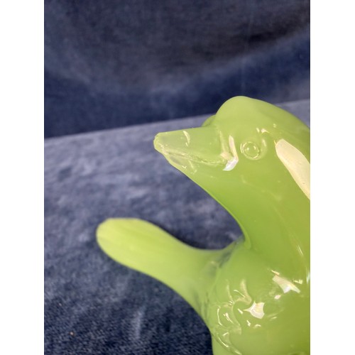 219 - Three pieces of jade depicting a buddha, a bird and an elephant.