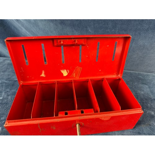 187 - A retro metal home savings thrift tin money box containing a quantity of coins from around the world... 