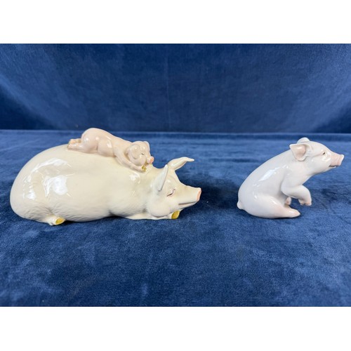220 - A collection of 5 china pig ornaments being Beswick, Lladro, Royal Copenhagen, Belleek - floral trea... 
