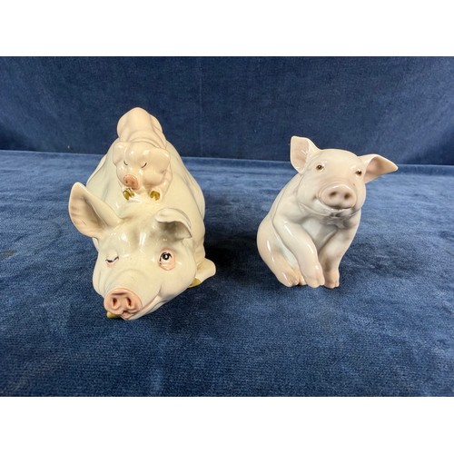 220 - A collection of 5 china pig ornaments being Beswick, Lladro, Royal Copenhagen, Belleek - floral trea... 