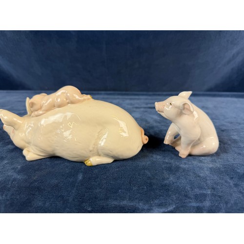 220 - A collection of 5 china pig ornaments being Beswick, Lladro, Royal Copenhagen, Belleek - floral trea... 